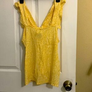 Pretty yellow top didn’t fit me. Brand is Ichi size medium